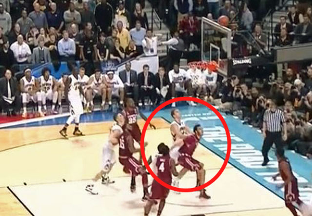 Iowa wins at the buzzer on this controversial play.