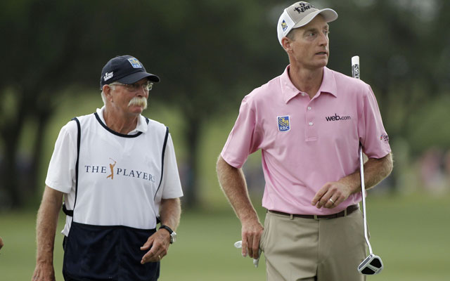 Fluff (left) is pulling double caddy duty for the 2014 U.S. Open.