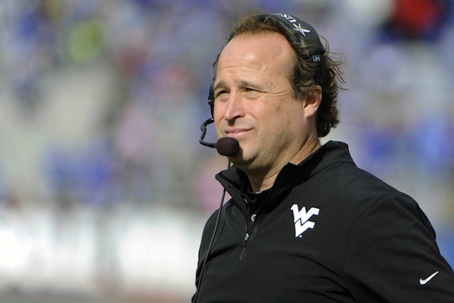 Oliver Luck says Dana Holgorsen will be back on the West Virginia sidelines in 2014.  (USATSI)