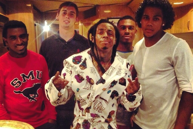 Lil Wayne hung out with Deion Sanders, Jr. and some SMU players while in Dallas. (Twitter)