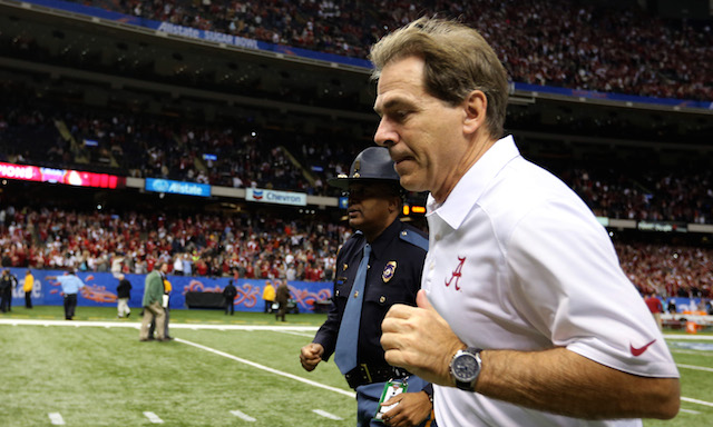 This is a photo of Nick Saban risking injury by moving too quickly
