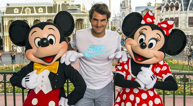 Roger Federer poses with Mickey and Minnie Mouse at the Magic Kingdom. (Provided)