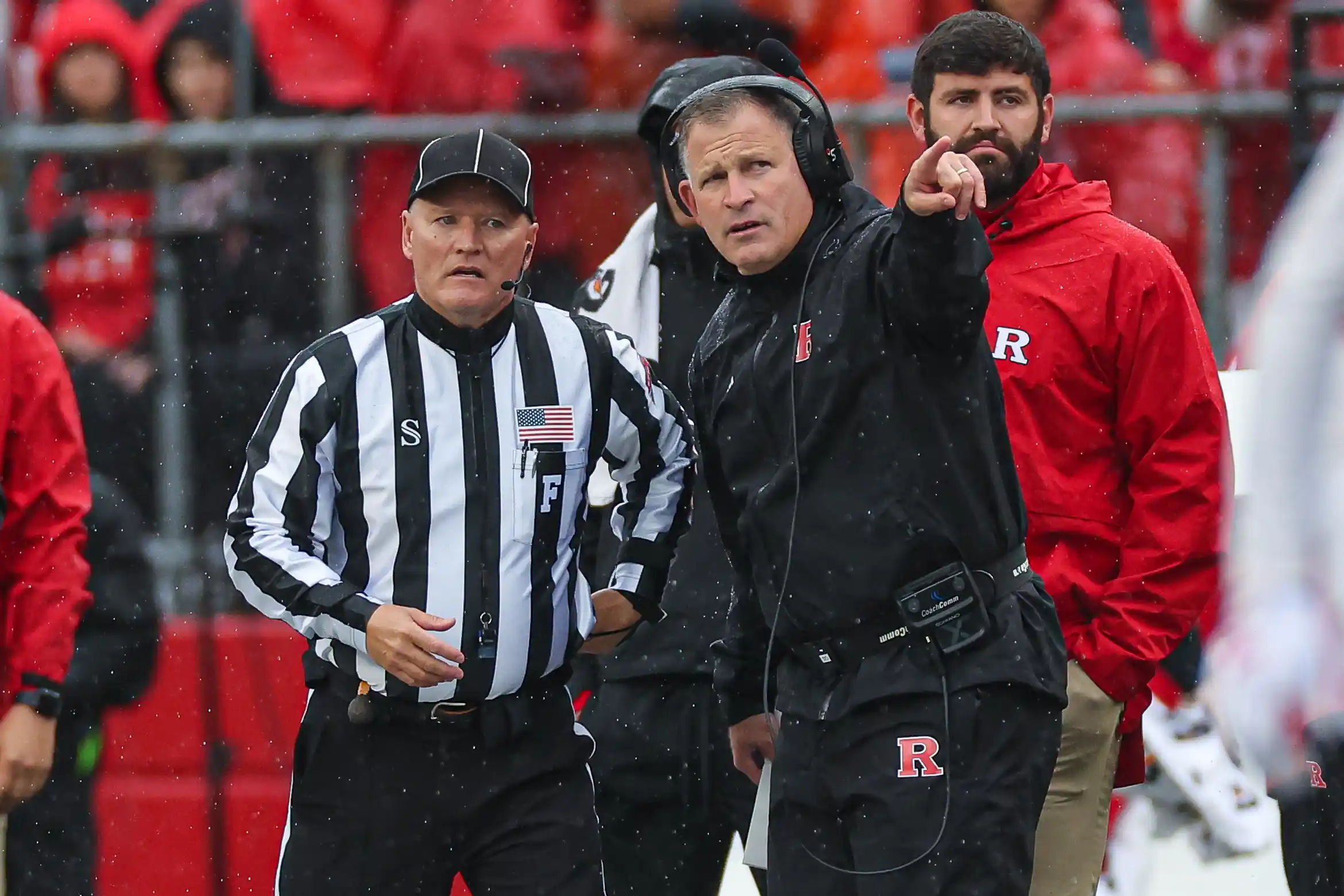 Rutgers Scarlet Knights head coach Greg Schiano talks with an official during the first half against the Michigan State Spartans at SHI Stadium.