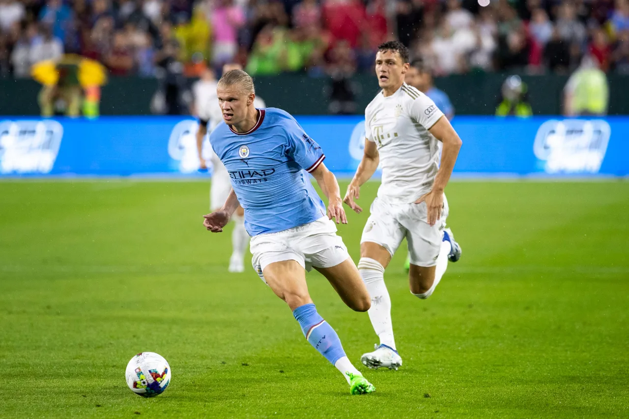Manchester City forward Erling Haaland (9) runs the ball during the exhibition match against FC Bayern Munich on Saturday, July 23, 2022, at Lambeau Field in Green Bay, Wis.