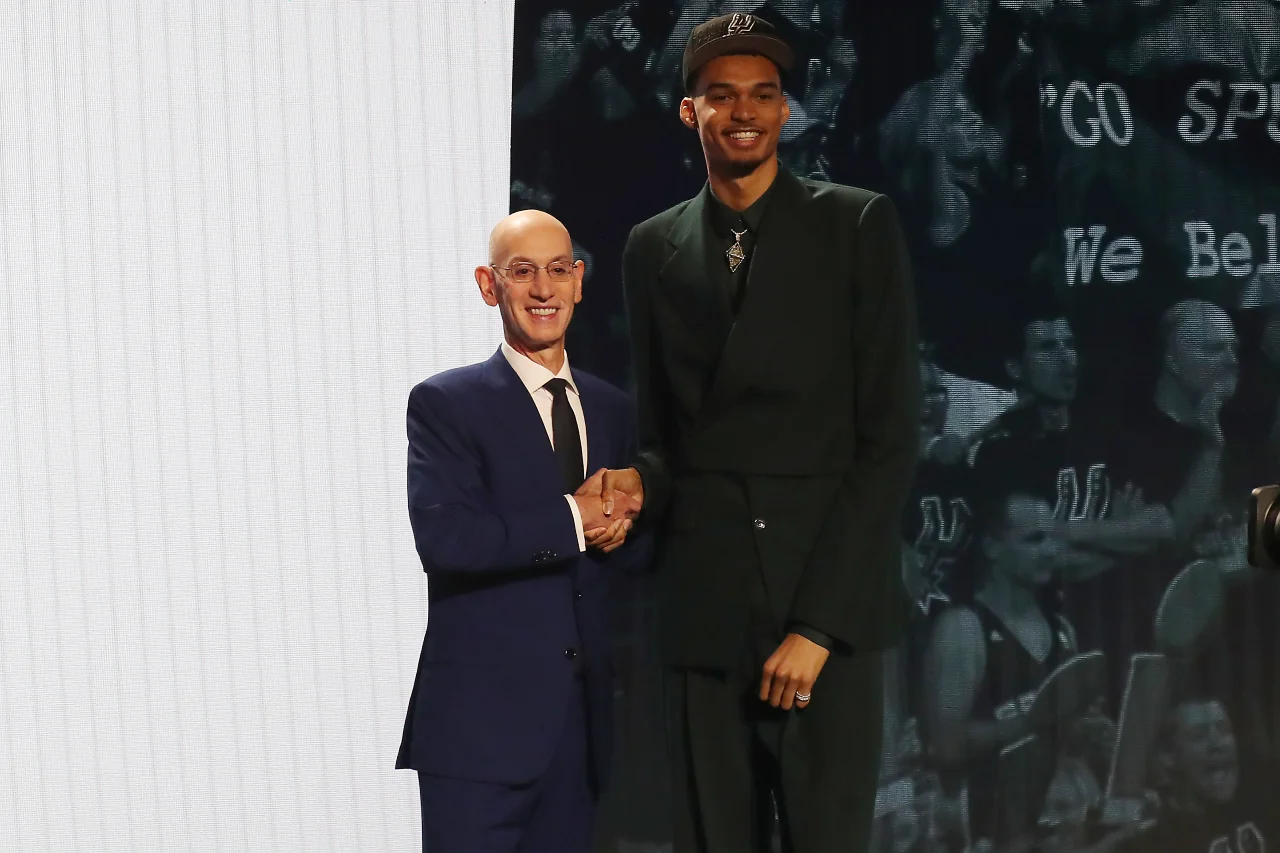 Victor Wembanyama poses for photos with NBA commissioner Adam Silver after being selected first by the San Antonio Spurs in the first round of the 2023 NBA Draft at Barclays Arena.