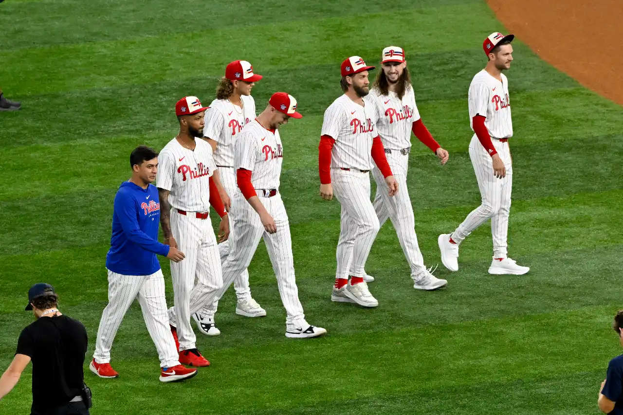 Jul 15, 2024; Arlington, TX, USA; The Philadelphia Phillies players of the National League walk on the field before the 2024 All Star Game Home Run Derby at Globe Life Field. Mandatory Credit: Jerome Miron-USA TODAY Sports