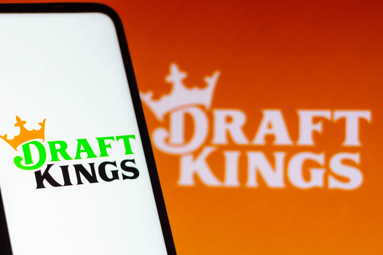 In this photo illustration the DraftKings logo seen displayed on a smartphone