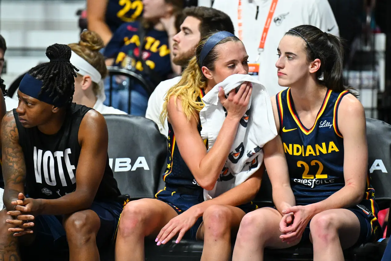 Sep 22, 2024; Uncasville, Connecticut, USA; Indiana Fever guard Lexie Hull (10) talks with Indiana Fever guard Caitlin Clark (22) in the fourth quarter during game one of the first round of the 2024 WNBA Playoffs at Mohegan Sun Arena.