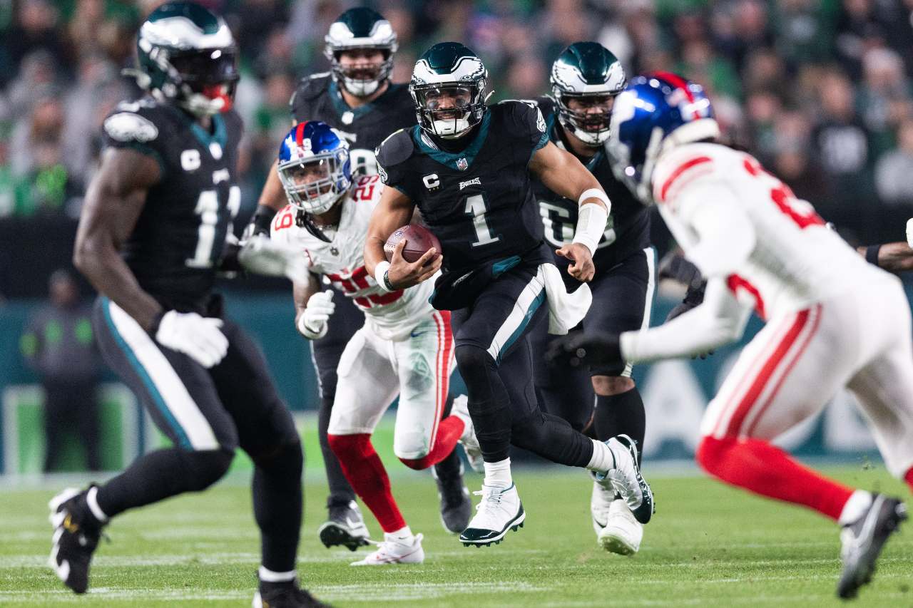 Philadelphia Eagles quarterback Jalen Hurts (1) runs with the ball against the New York Giants during the second quarter at Lincoln Financial Field.