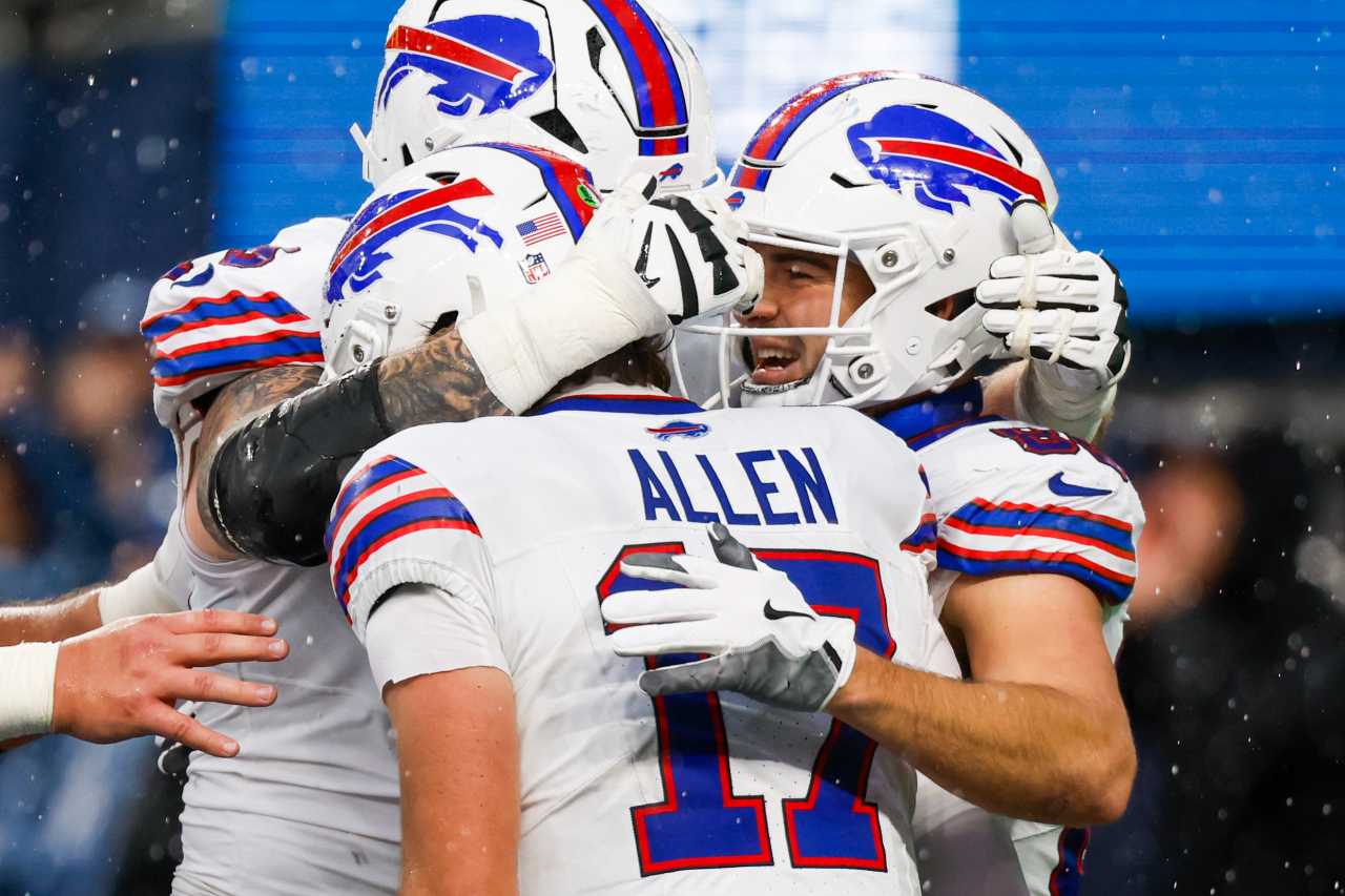 Buffalo Bills tight end Dalton Kincaid (86) celebrates with quarterback Josh Allen (17) after catching a touchdown pass against the Seattle Seahawks during the second quarter at Lumen Field.