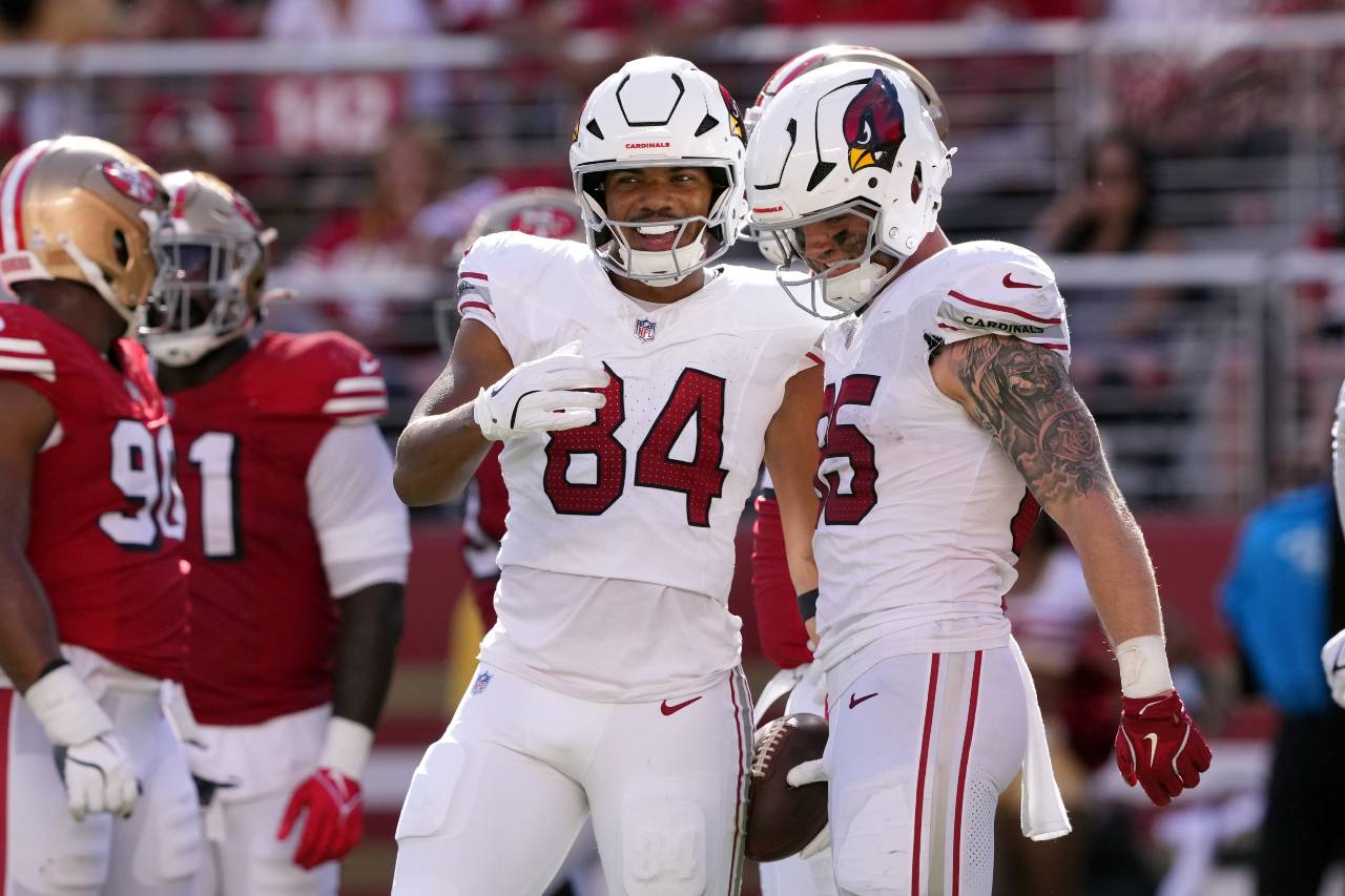 Arizona Cardinals tight end Elijah Higgins (84) celebrates with tight end Trey McBride (right) after scoring a touchdown against the San Francisco 49ers during the fourth quarter at Levi's Stadium.