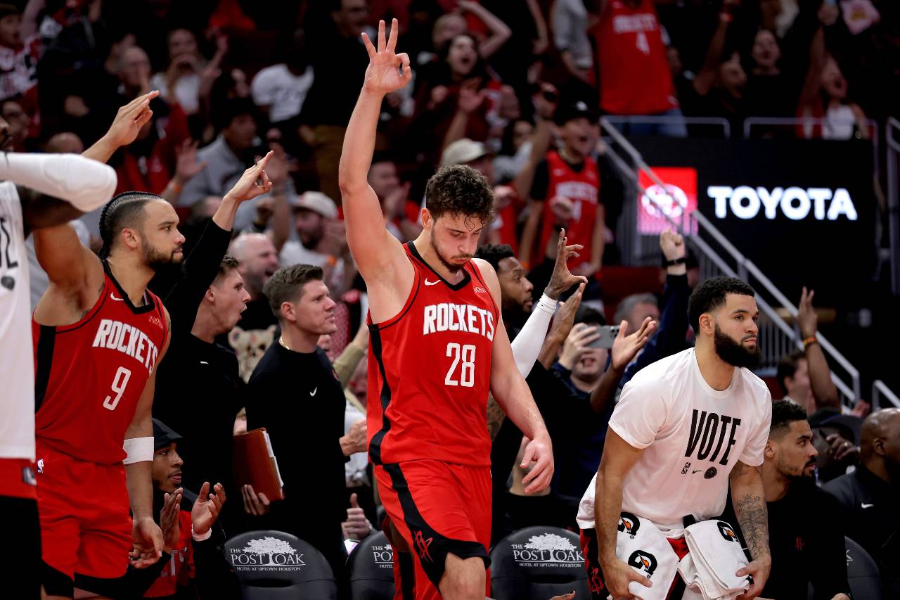 Houston Rockets center Alperen Sengun (28) reacts on the bench after a made basket against the Golden State Warriors during the fourth quarter at Toyota Center.