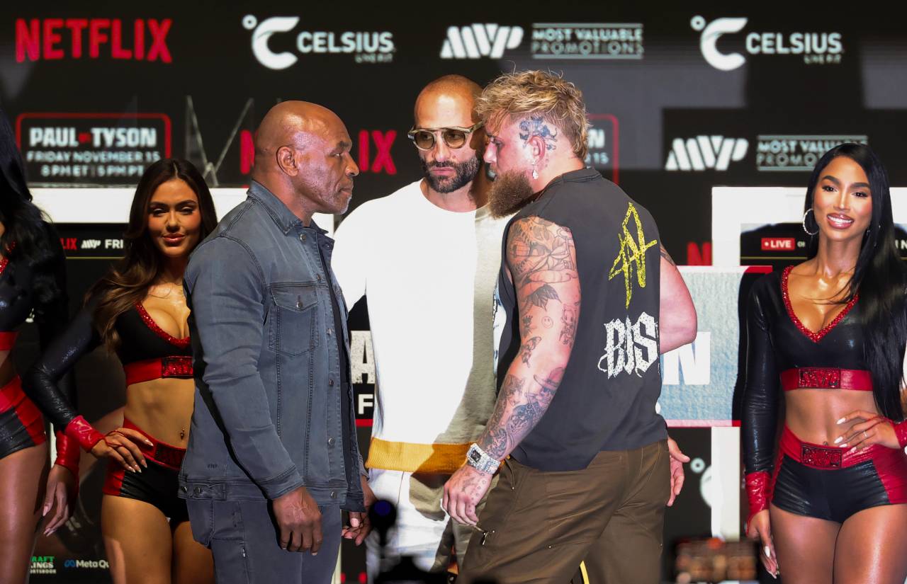 Jake Paul (right) faces off with Mike Tyson (left) during a press conference at The Pavilion at Toyota Music Factory.